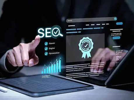 Hands at a laptop and tablet with a floating search results dashboard and a rising chart